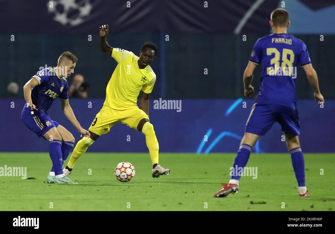 Mislav Orsic of Dinamo and Adama Traore of Sheriff compete for the ball during the UEFA Champions League Play-Offs Leg Two match between Dinamo Zagreb and FC Sheriff at Maksimir Stadium on August 25, 2021 in Zagreb, Croatia. Photo: Goran Stanzl/Pixsell Stock Photo