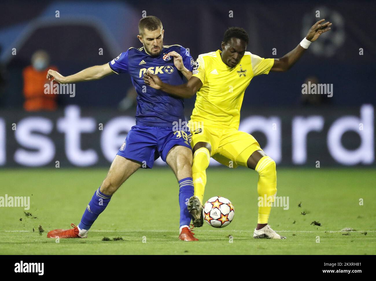 Bartol Franjic of Dinamo in action against Adama Traore of Sheriff during the UEFA Champions League Play-Offs Leg Two match between Dinamo Zagreb and FC Sheriff at Maksimir Stadium on August 25, 2021 in Zagreb, Croatia. Photo: Slavko Midzor/Pixsell Stock Photo