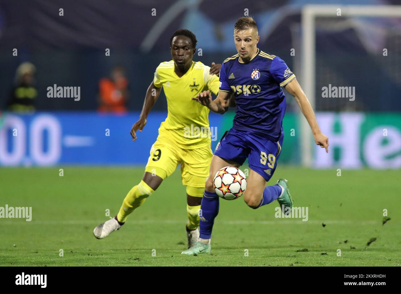 Mislav Orsic of Dinamo in action against Adama Traore of Sheriff during the UEFA Champions League Play-Offs Leg Two match between Dinamo Zagreb and FC Sheriff at Maksimir Stadium on August 25, 2021 in Zagreb, Croatia. Photo: Goran Stanzl/Pixsell Stock Photo