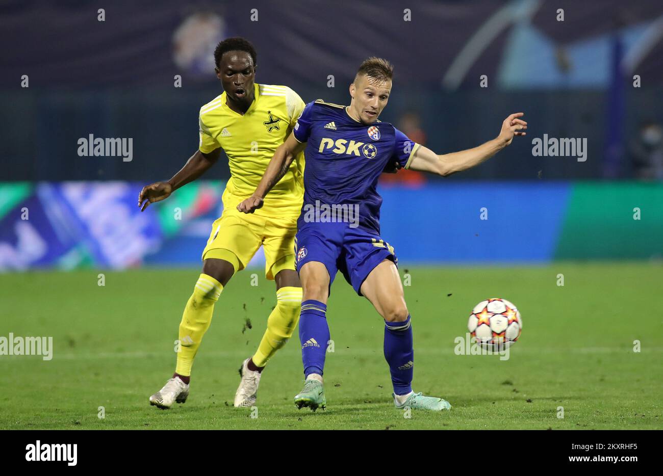 Mislav Orsic of Dinamo in action against Adama Traore of Sheriff during the UEFA Champions League Play-Offs Leg Two match between Dinamo Zagreb and FC Sheriff at Maksimir Stadium on August 25, 2021 in Zagreb, Croatia. Photo: Goran Stanzl/Pixsell Stock Photo