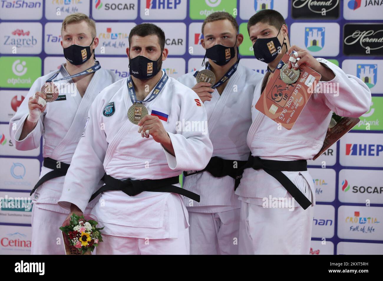 ZAGREB, CROATIA - SEPTEMBER 26: (L-R) Silver medalist Dario Kurbjeweit Garcia of Germany, gold medalist Arman Adamian of Russia and bronze medalists Simeon Catharina of Netherlands and Marko Kumric of Croatia during the Men's -100kg medal ceremony on day 3 of the Judo Grand Prix Zagreb 2021 at Arena Zagreb in Zagreb, Croatia on September 26, 2021. Photo: Igor Kralj/PIXSELL Stock Photo