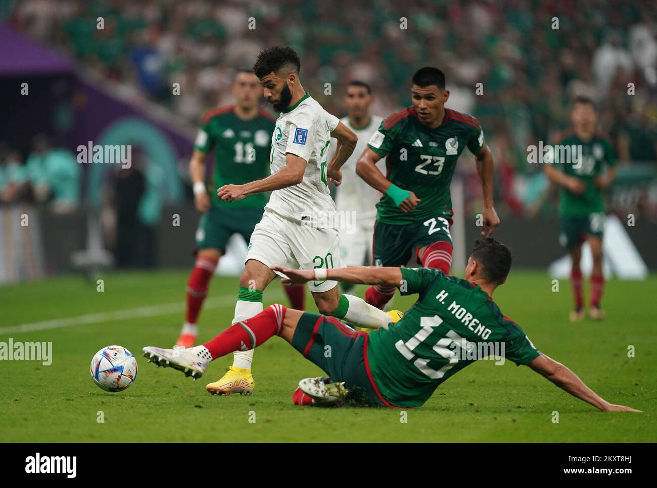 Saudi Arabia's Abdulrahman Al-Aboud (left) and Mexico's Hector Moreno battle for the ball during the FIFA World Cup Group C match at the Lusail Stadium in Lusail, Qatar. Picture date: Wednesday November 30, 2022. Stock Photo