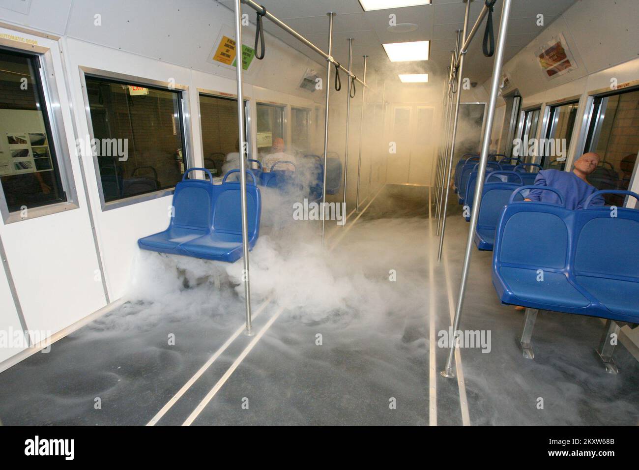 Chemical/Biological - Anniston, Ala. , Sep. 5, 2012   Smoke fills the room in a rail car during a simulated subway accident at the Center for Domestic Preparedness (CDP). The CDP created a subway system, complete with full size rail cars, lighting, seating, and even the commercial signage common on subways... Photographs Relating to Disasters and Emergency Management Programs, Activities, and Officials Stock Photo