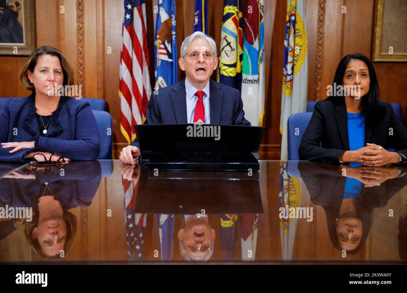 U.S. Attorney General Merrick Garland is flanked by Deputy Attorney General Lisa O. Monaco and Associate Attorney General Vanita Gupta as he discusses the verdict in the trial of Oath Keepers leaders and members in connection with in the January 6 attack on the Capitol, during a news conference at the Justice Department in Washington, U.S., November 30, 2022. REUTERS/Jim Bourg Stock Photo