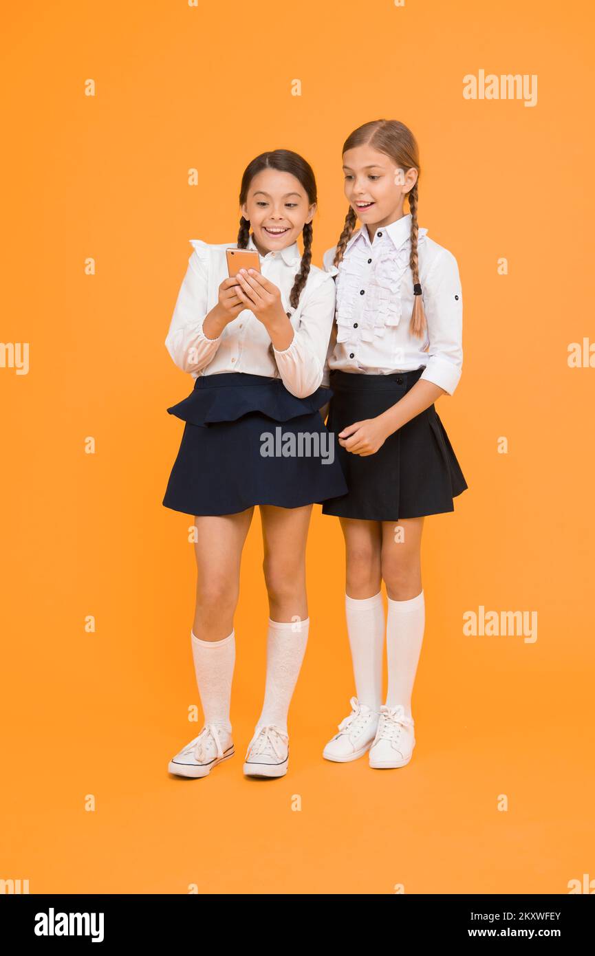 Schoolgirls uniform phone hi-res stock photography and images - Alamy