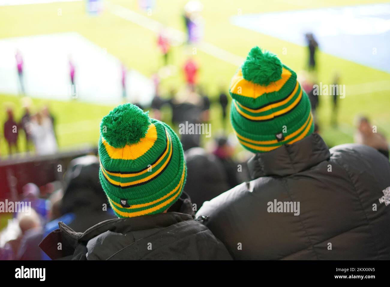 Australian green and gold bobble hats on rugby league supporters at rugby league cup 2021, October 2022, Coventry Building Society Arena Stock Photo
