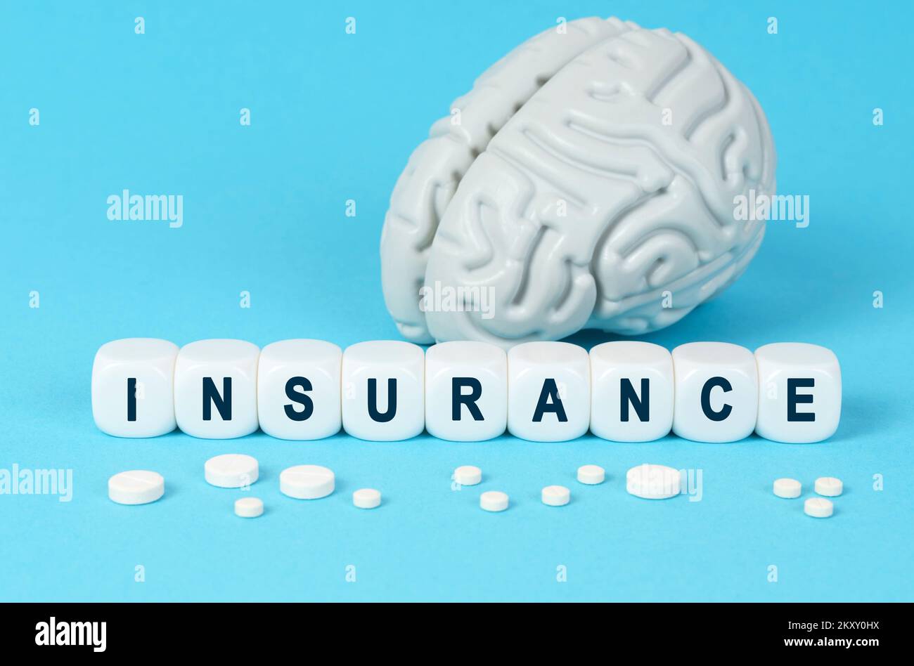 Medicine and health. Cubes lie on the table among the pills and