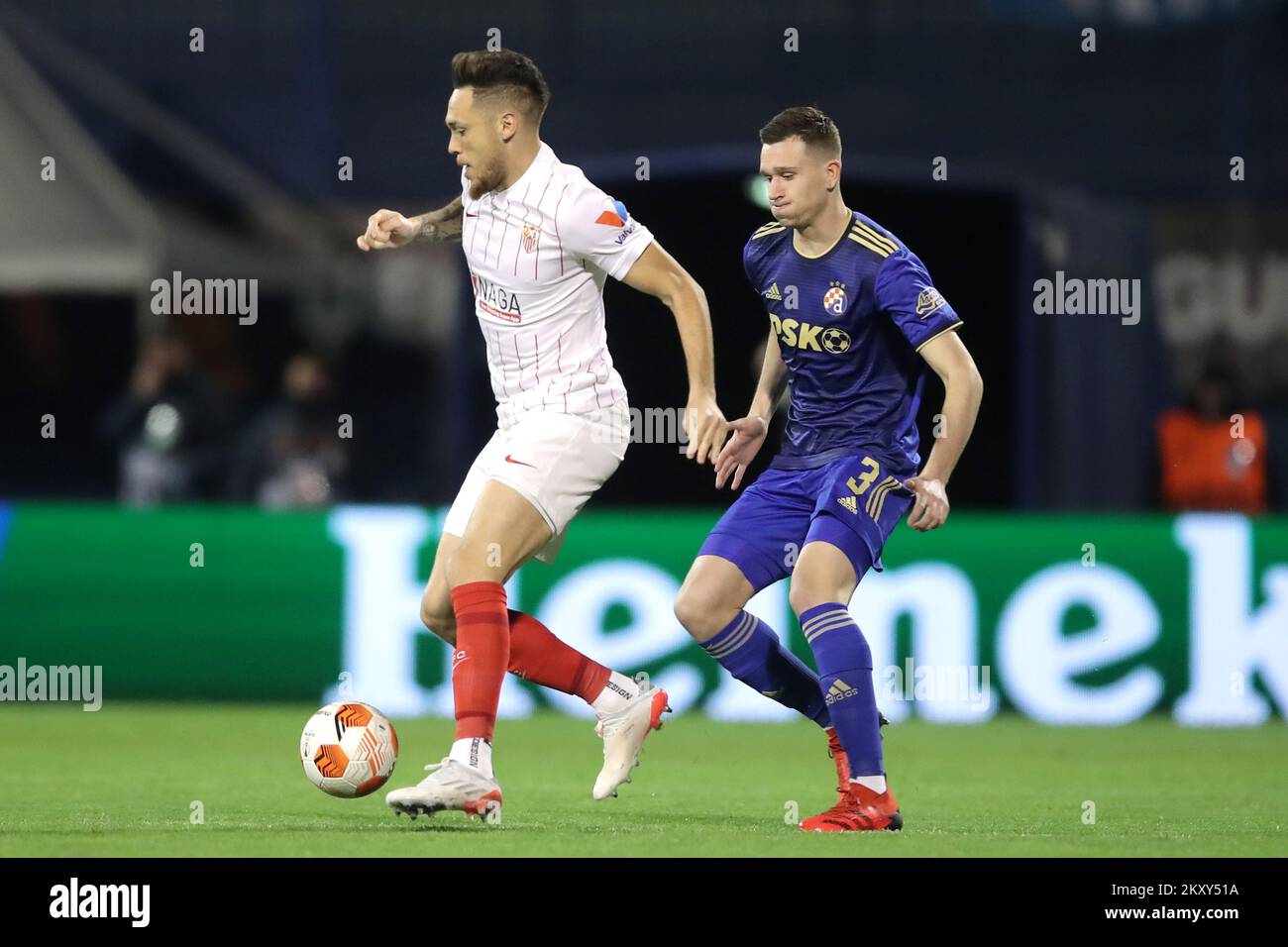 ZAGREB, CROATIA - FEBRUARY 24: Lucas Ocampos of Sevilla FC and Daniel Stefulj of Dinamo Zagreb in action during the UEFA Europa League Knockout Round Play-Offs Leg Two match between Dinamo Zagreb and Sevilla FC at Maksimir Stadium on February 24, 2022 in Zagreb, Croatia. Photo: Luka Stanzl/PIXSELL Stock Photo
