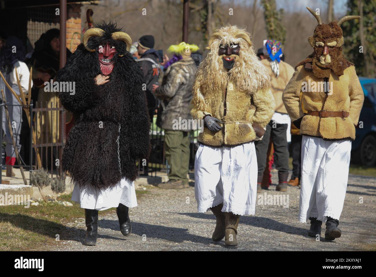 Masked persons called Baranja Buses take part in parade in villages of Eastern Slavonia and Baranja at village Topolje near Osijek, Croatia on March 1, 2022. According to legend, the Buse drive away winter with their terrible masks, and it is believed that the inhabitants of this area, disguised in ancient times, drove away the great Turkish imperial army. Photo: Dubravka Petric/PIXSELL Stock Photo