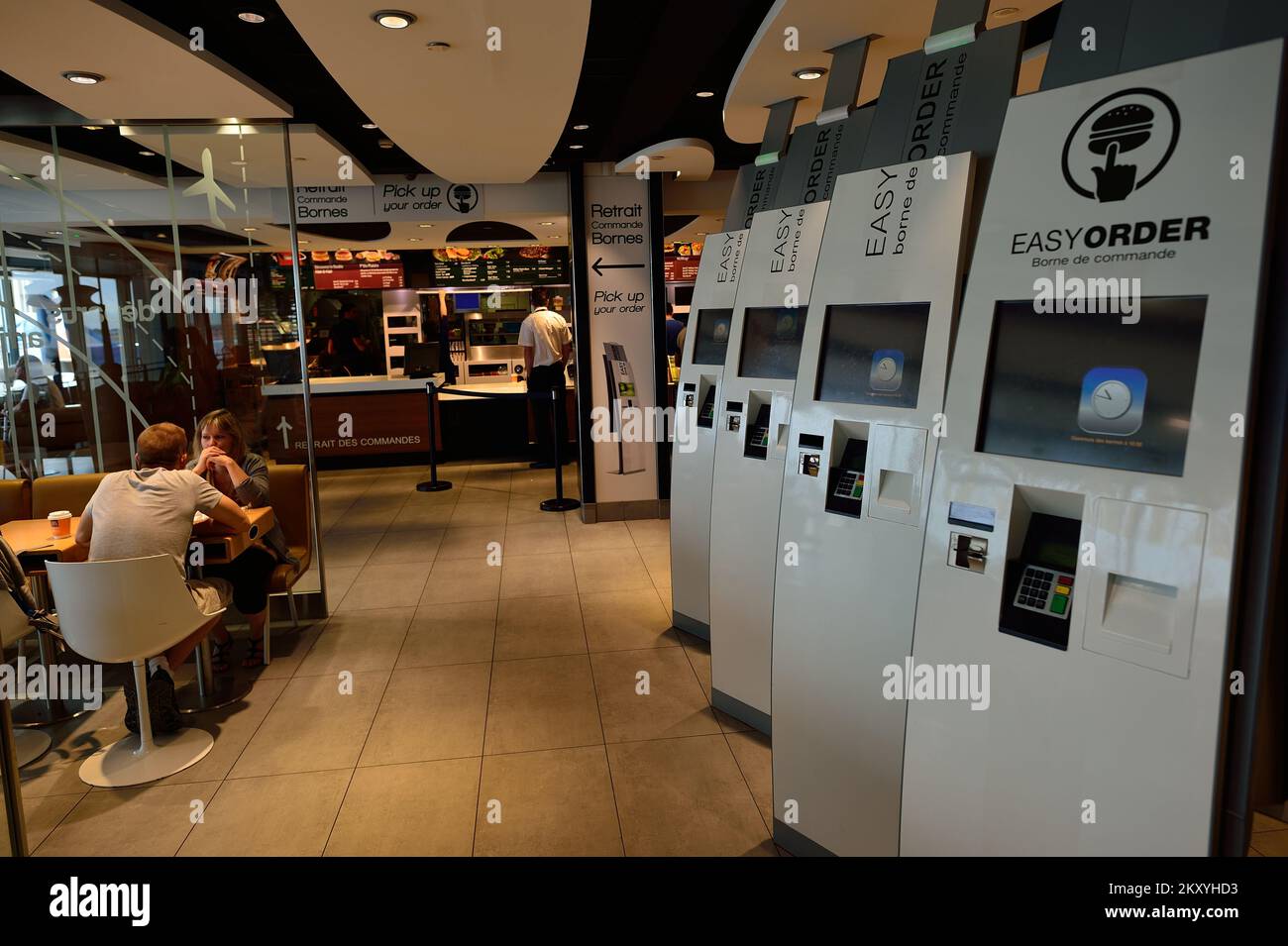 PARIS - AUGUST 08, 2015: McDonald's restaurant interior. McDonald's is the world's largest chain of hamburger fast food restaurants, founded in the Un Stock Photo