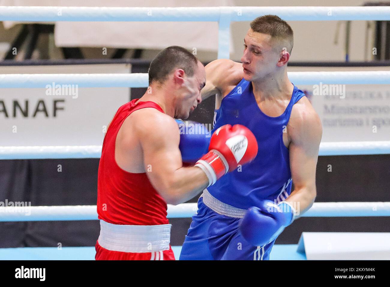 Luka Matchutadze of Georgia (red) fights Bogdan Tolmachov of Ukraine (blue)  during the EUBC U22 European Boxing Championships Light Heavyweight  (75-80kg) match at Intersport Hall on March 14, 2022 in Porec, Croatia.