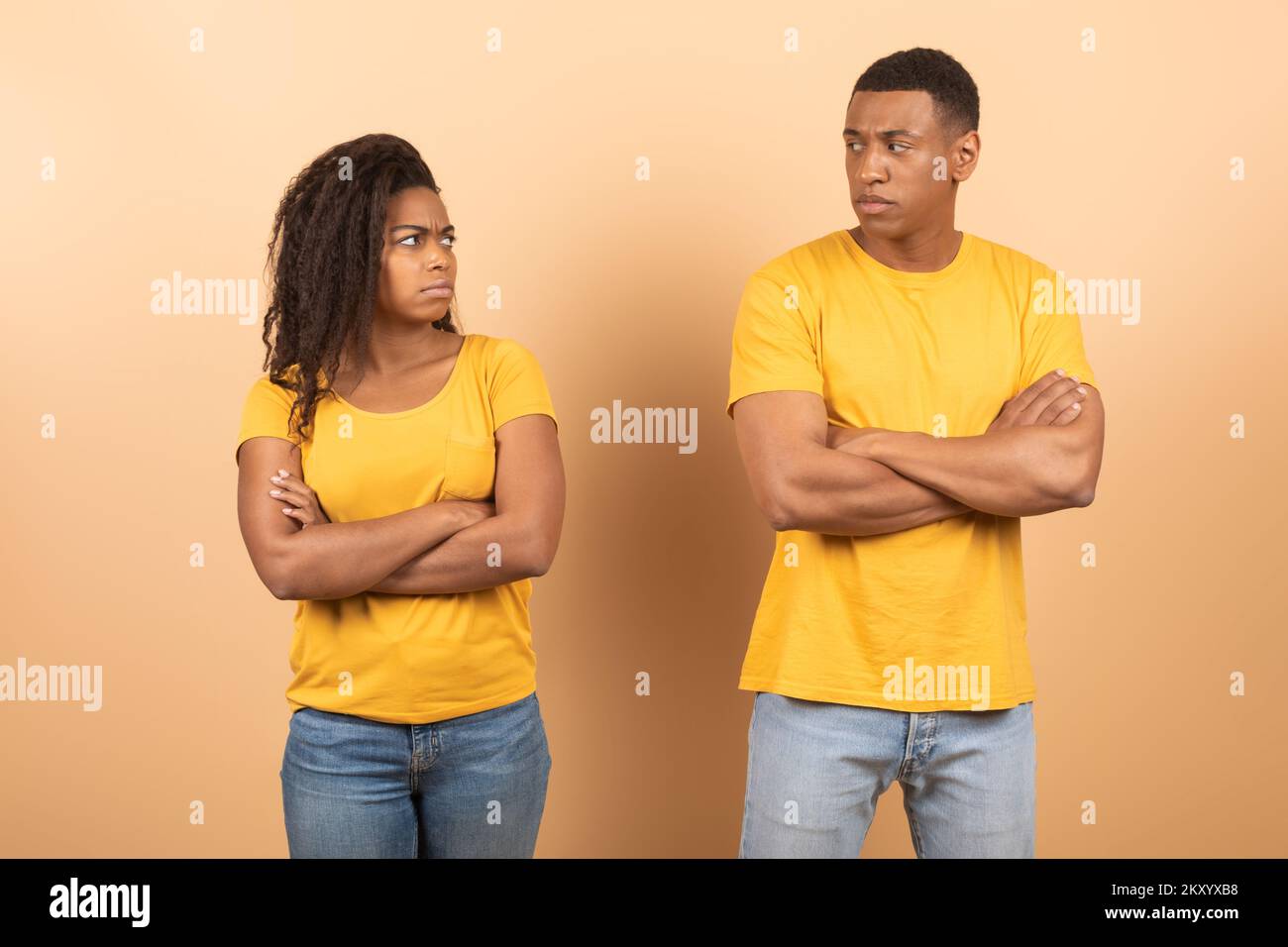 African american young couple standing separate and crossing hands, don't talk to each other after family quarrel Stock Photo