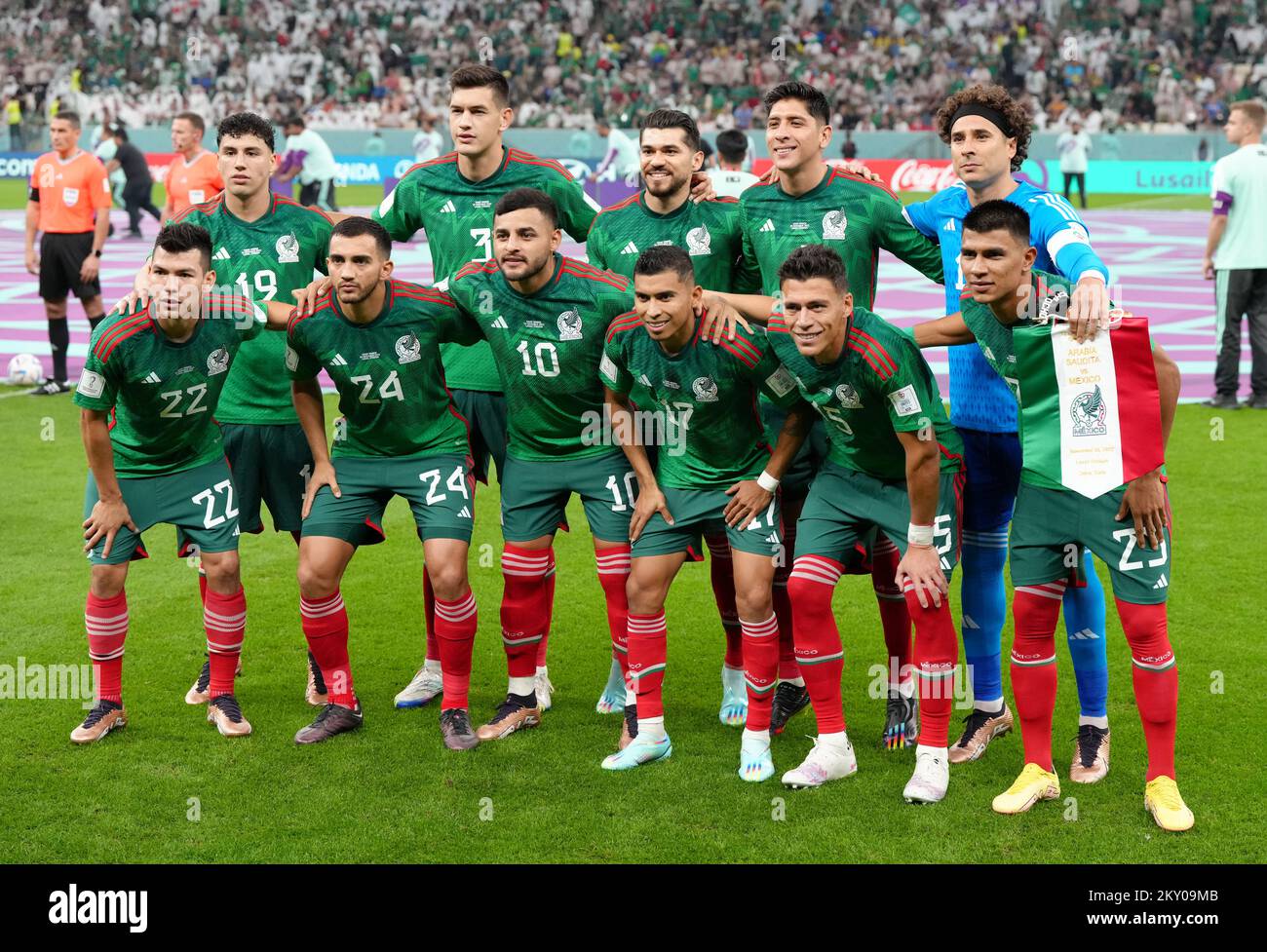 Mexico players, back row, left to right, Jorge Sanchez, Cesar Montes, Henry Martin, Edson Alvarez, Guillermo Ochoa, front row, left to right, Hirving Lozano, Luis Chavez, Alexis Vega, Orbelin Pineda, Hector Moreno and Jesus Gallardo line up before the FIFA World Cup Group C match at the Lusail Stadium in Lusail, Qatar. Picture date: Wednesday November 30, 2022. Stock Photo