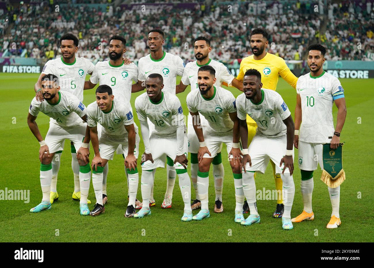 Saudi Arabia players, back row, left to right, Ali Al-Bulaihi, Firas Al-Buraikan, Mohamed Kanno, Ali Al-Hassan, Mohammed Al-Owais, Salem Al-Dawsari, front row, left to right, Abdulelah Al-Amri, Sultan Al-Ghannam, Saud Abdulhamid, Saleh Al-Shehri and Hassan Al-Tambakti line up before the FIFA World Cup Group C match at the Lusail Stadium in Lusail, Qatar. Picture date: Wednesday November 30, 2022. Stock Photo