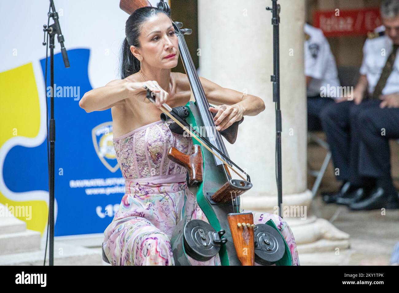 Cellist Ana Rucner playing cello made from weapons in Rector's Palace ...