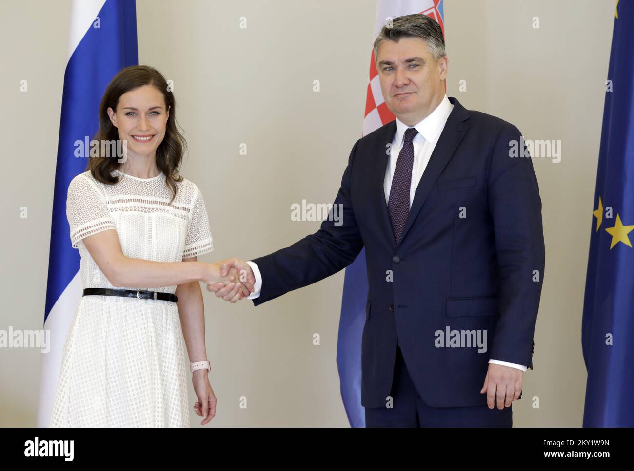 The Finnish Prime Minister and the Croatian President can be seen posing for photographers ahead of a meeting at the President's Office. The Prime Minister of the Republic of Finland Sanna Marin is on an official visit to the Republic of Croatia. She was received by President Zoran Milanovic in his office at Pantovcak, in Zagreb, Croatia, on June 21 2022. Photo: Jurica Galoic/PIXSELL Stock Photo