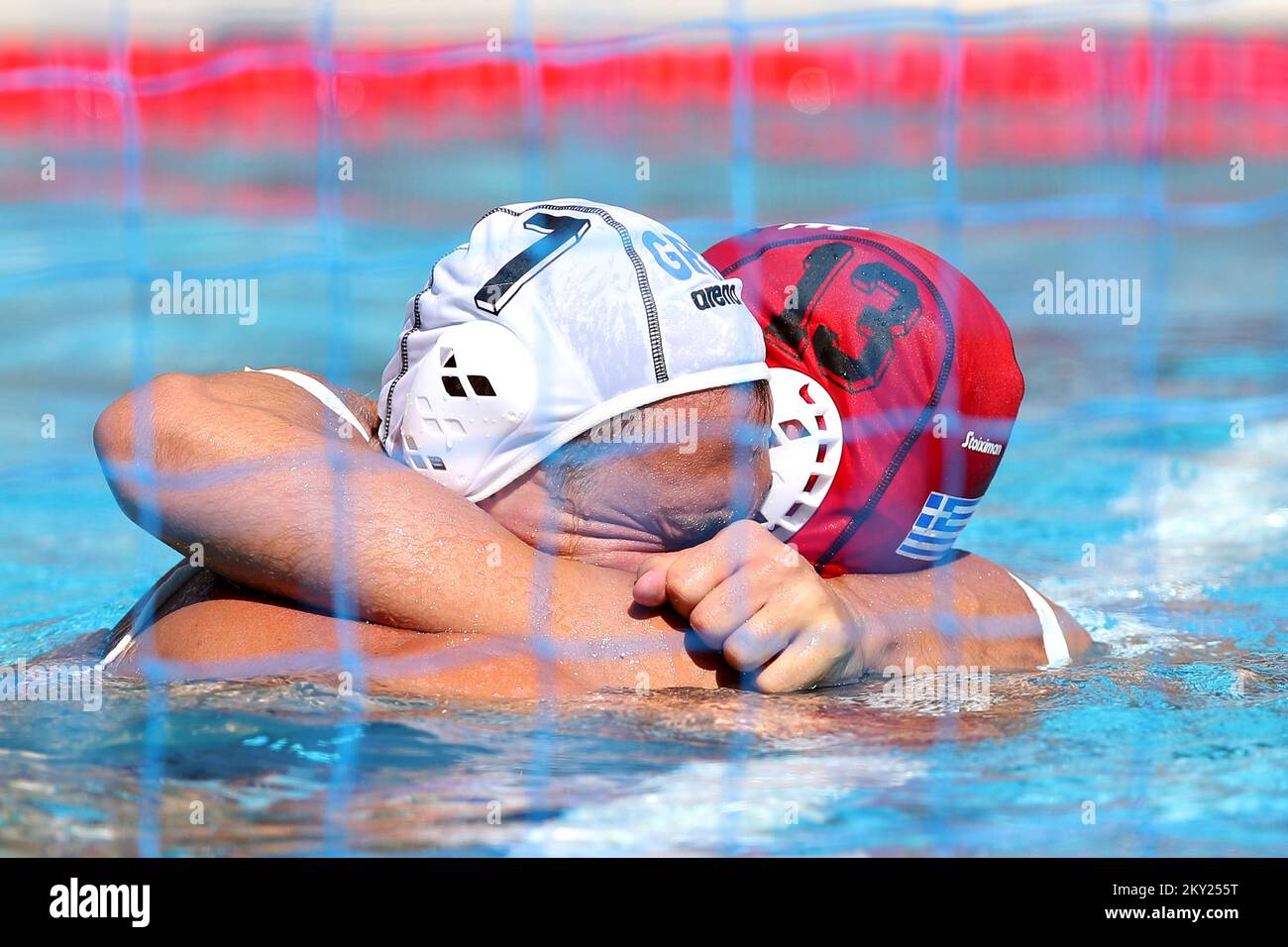 The Greek national water polo team celebrates their victory after the Men's Bronze Medal Match