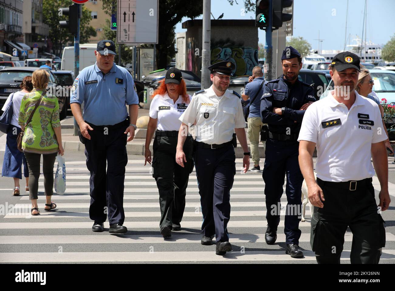 Police officers from Germany, Slovakia and Poland accompanied by a Croatian  policeman on patrol in Rijeka, Croatia on July 7, 2022. Police officers  from nine foreign countries, 433 of them, will help