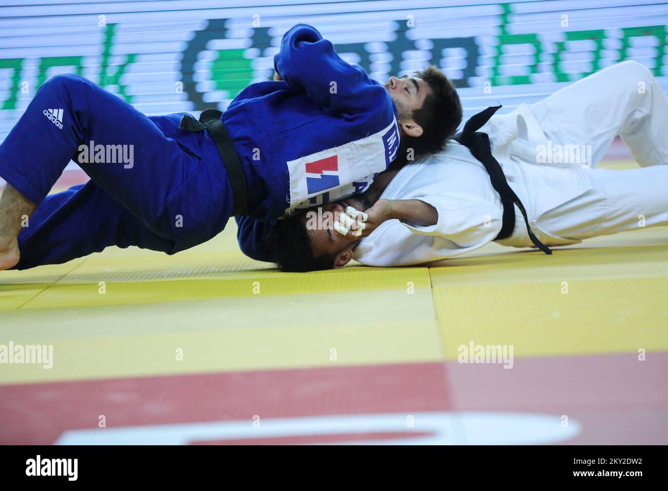 Manuel Lombardo of Italy in a fight against Magdiel Estrada of Cuba in the  category of men up to 73kg during the IJF World Tour Zagreb Grand Prix,  held at the Zagreb