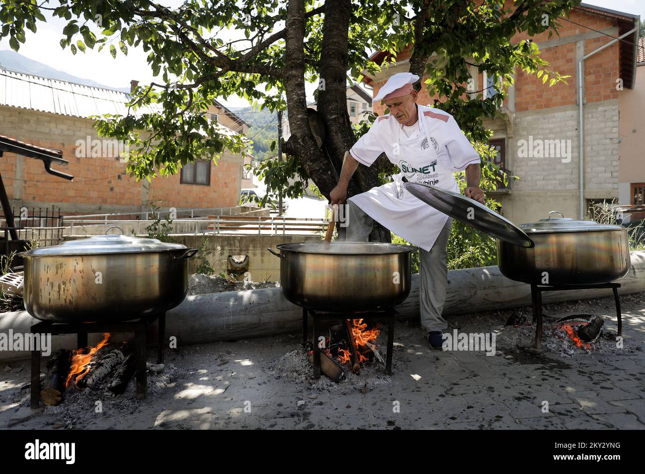 The village cook prepares food for the circumcision festival in the village of Donje Ljubinje