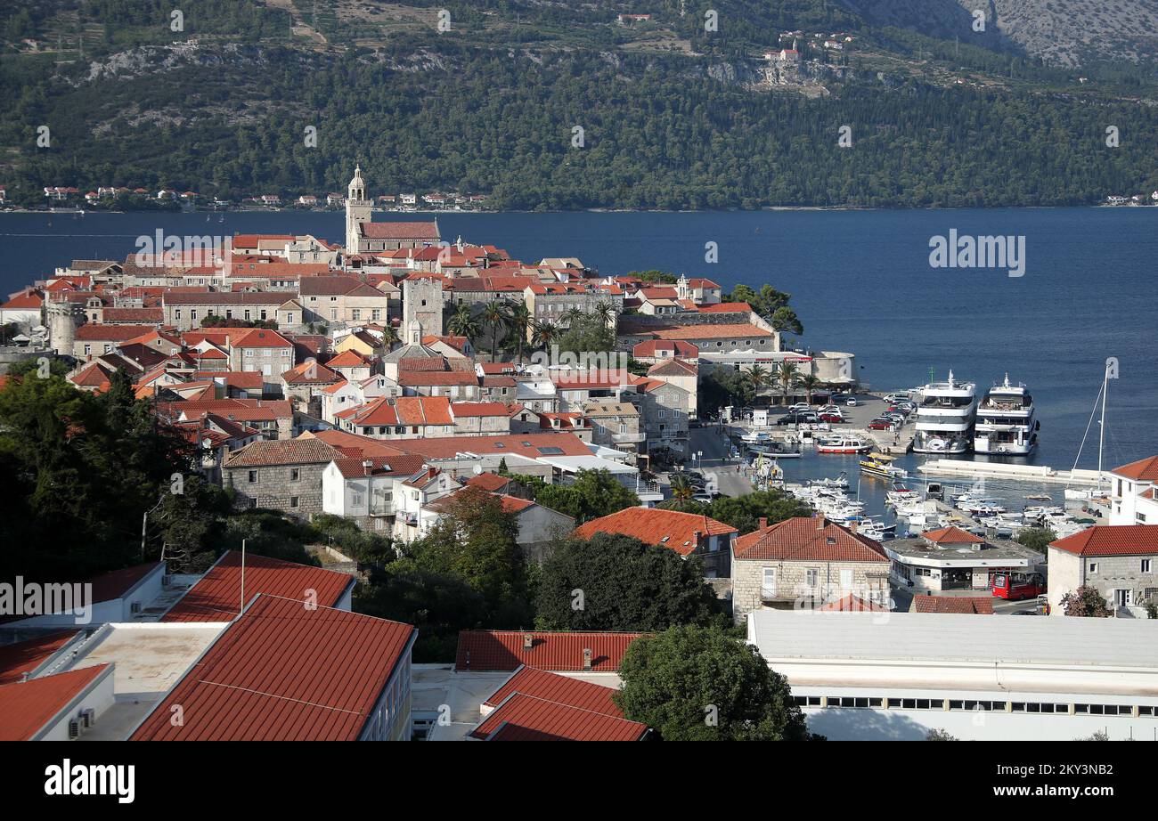 Tourists enjoy a sunny day on Korcula, Croatia on September 3, 2022. Korcula is a historical fortified town on the east coast of the island of Korcula. The old town is surrounded by walls, and the streets are laid out in herringbone patterns, allowing for free air flow, but also protection from strong winds. Photo: Sanjin Strukic/PIXSELL Stock Photo