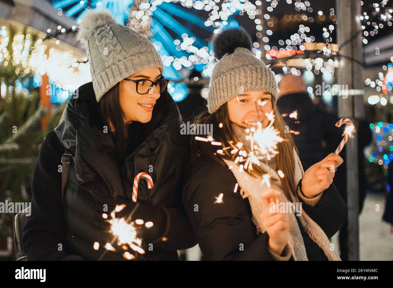 Young women during christmas hi res stock photography and images Alamy