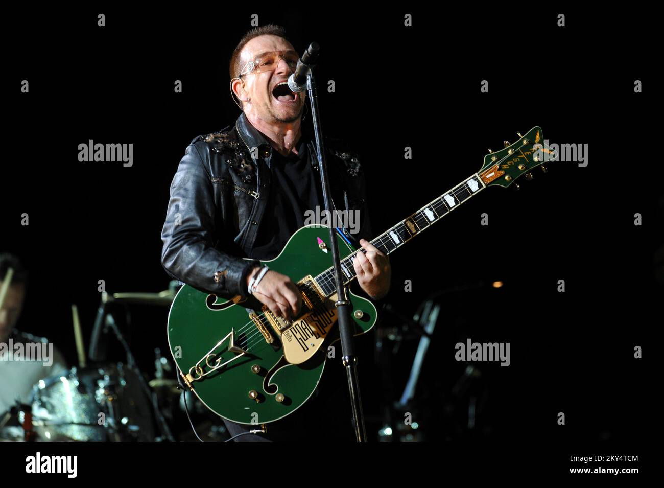 U2's Bono performs during their 360 world tour at the Camp Nou stadium in Barcelona Stock Photo