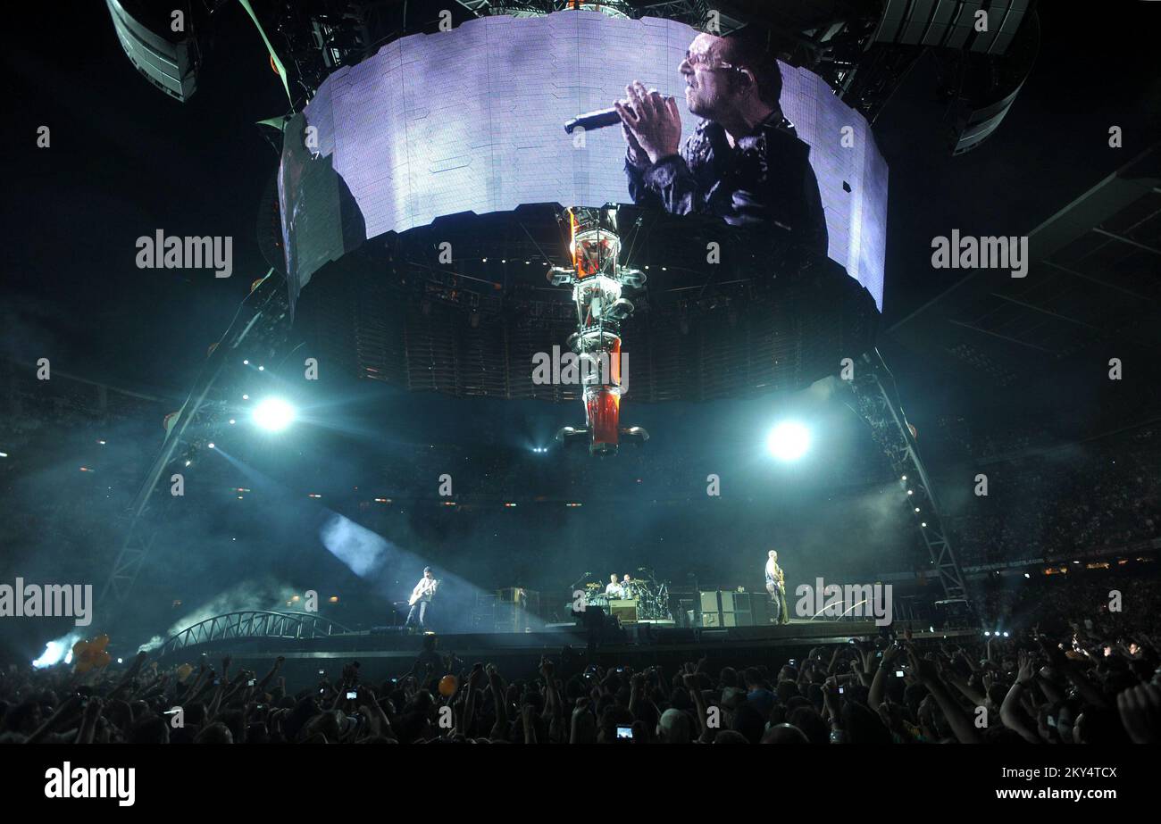 U2's Bono performs during their 360 world tour at the Camp Nou stadium in Barcelona Stock Photo