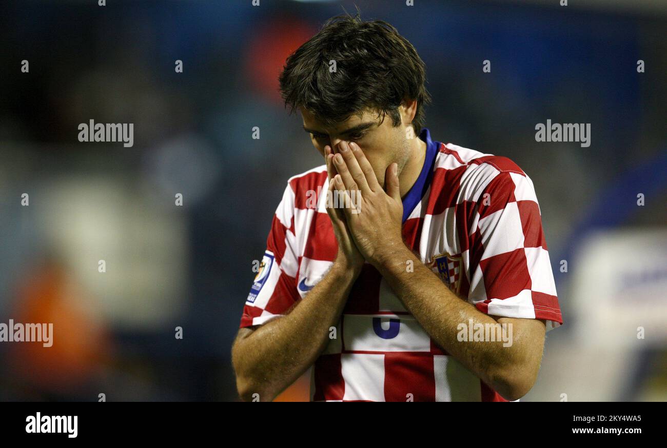 Croatia's Vedran Corluka walks off the pitch after being shown a red