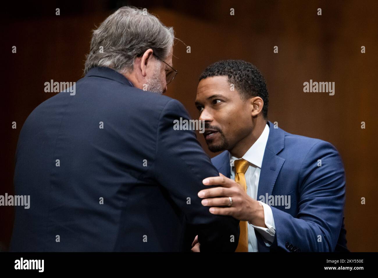 Washington, United States Of America. 30th Nov, 2022. United States Senator Gary Peters (Democrat of Michigan), left, gets a hug after offering remarks to support Jonathan James Canada Grey, right, during a Senate Committee on the Judiciary hearing for his nomination to be United States District Judge for the Eastern District of Michigan, in the Dirksen Senate Office Building in Washington, DC, Wednesday, November 30, 2022. Credit: Rod Lamkey/CNP/Sipa USA Credit: Sipa USA/Alamy Live News Stock Photo