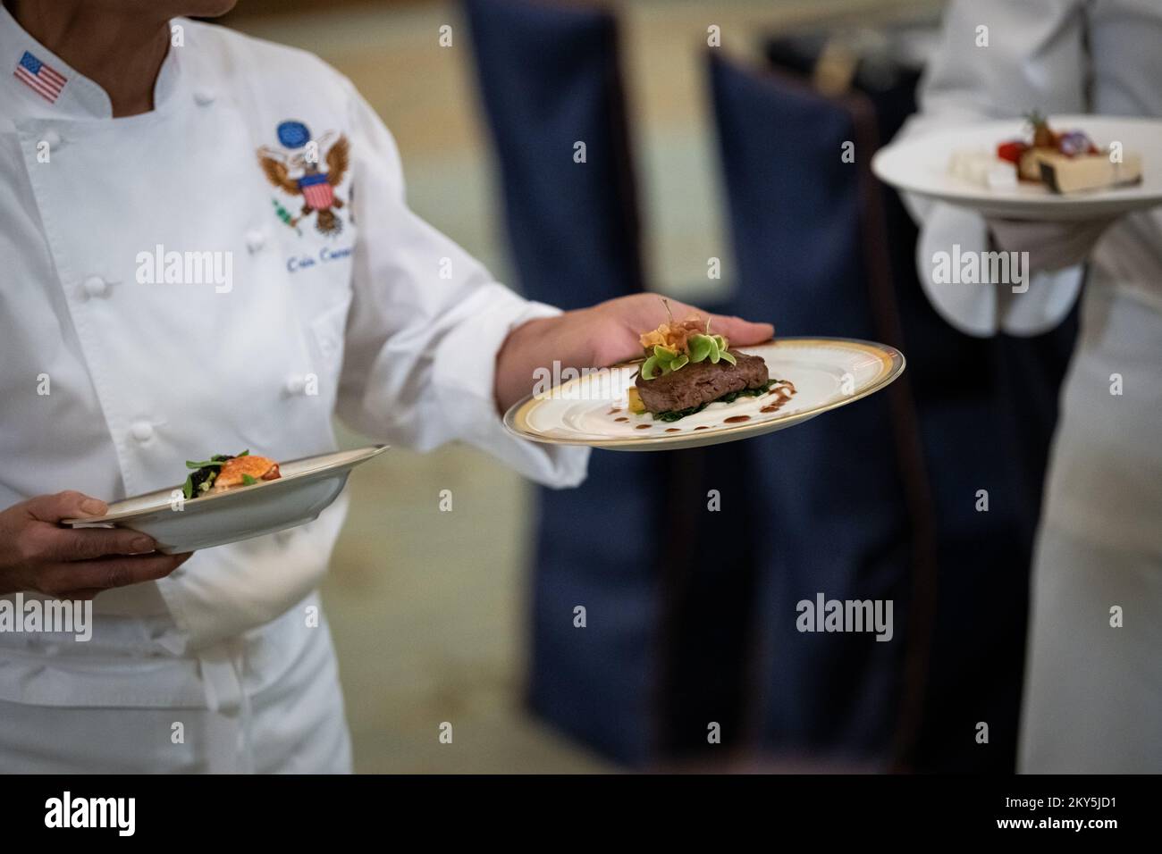 White House Executive Chef Cris Comerford presents dinner courses during a state dinner preview