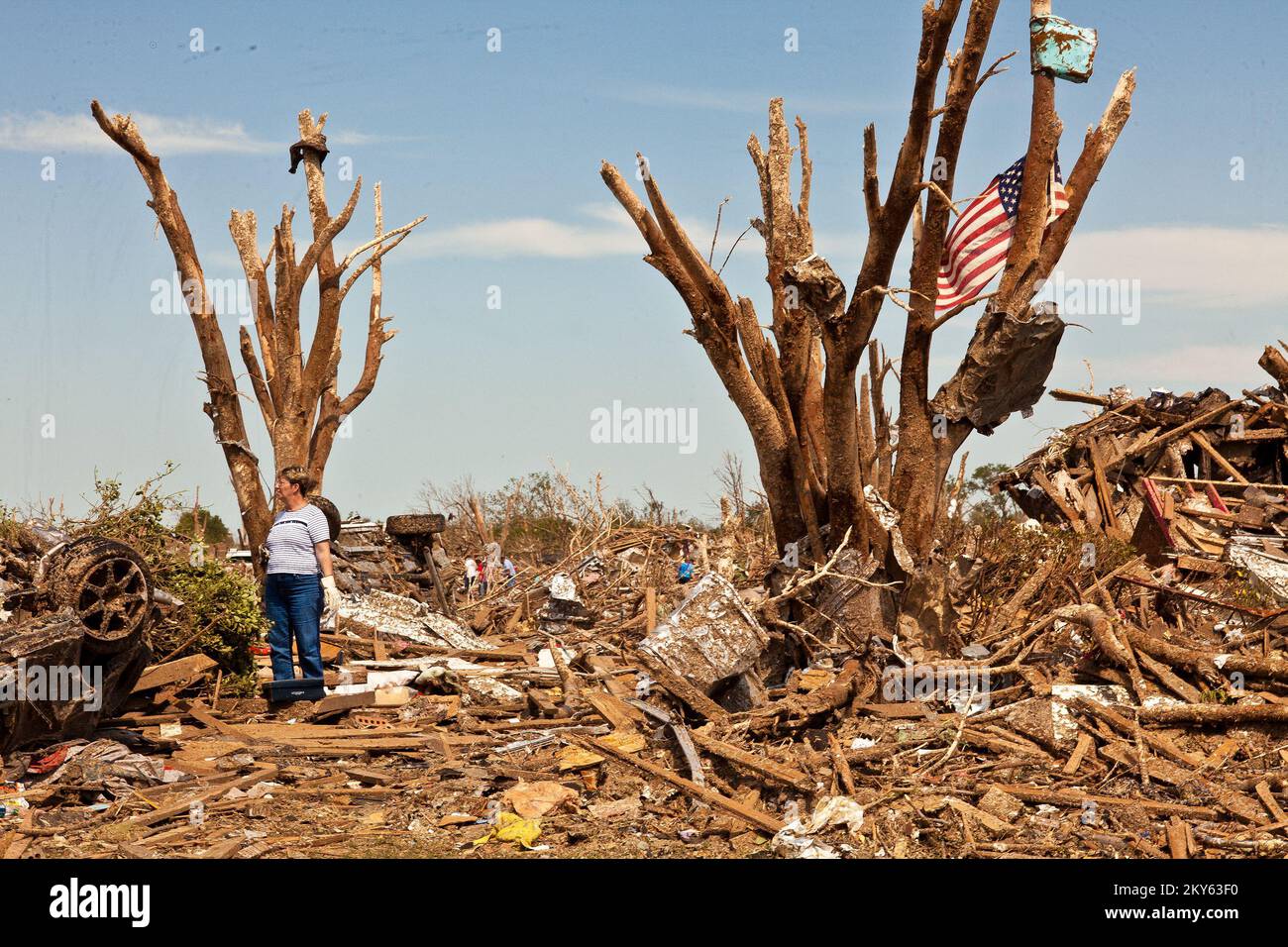 Moore, Okla., May 22, 2013   Moore resident looks at home destruction caused by an F5 tornado that struck on May 20. Andrea Booher/FEMA.. Photographs Relating to Disasters and Emergency Management Programs, Activities, and Officials Stock Photo