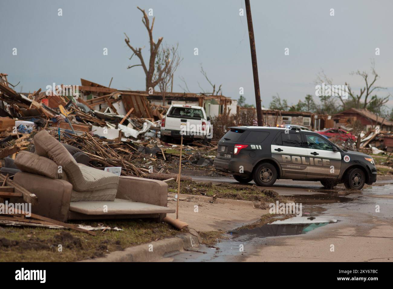 Moore, Okla., May 23, 2013   Local police keep watch on neighborhoods in Moore after a F5 tornado struck the town. Andrea Booher/FEMA.. Photographs Relating to Disasters and Emergency Management Programs, Activities, and Officials Stock Photo