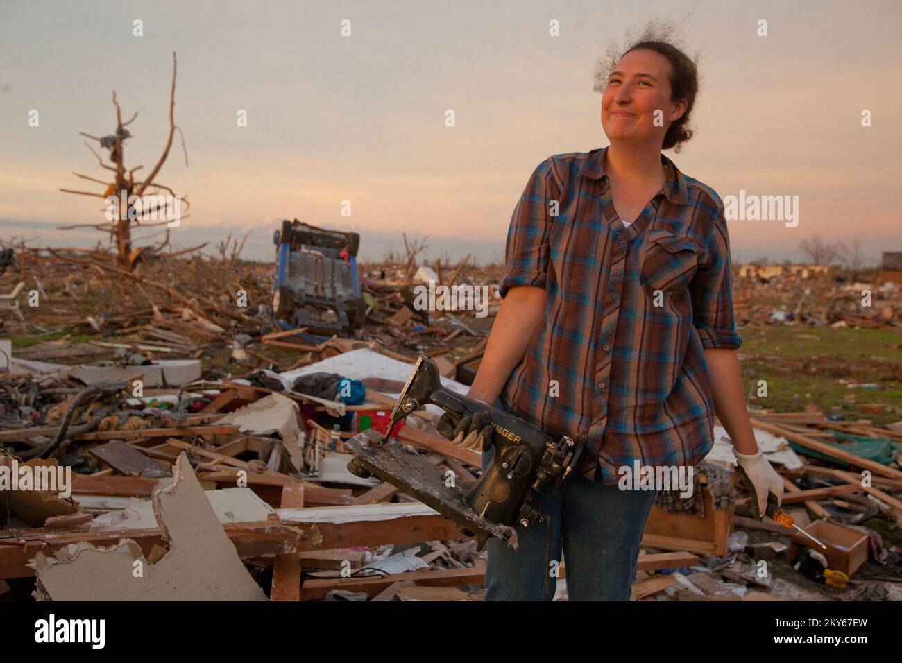Moore, Okla., May 23, 2013   Moore resident, Kathryn Hudgins beams after recovering her friend's Singer sewing machine. The Town of Moore was struck by a F5 tornado on May 20th. Andrea Booher/ .. Photographs Relating to Disasters and Emergency Management Programs, Activities, and Officials Stock Photo