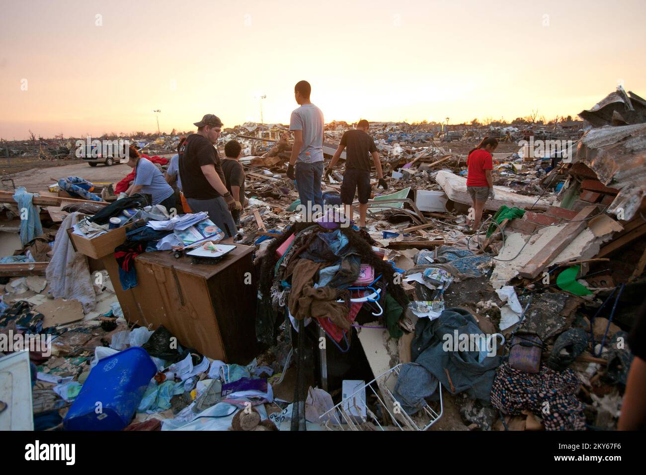 Moore, Okla., May 23, 2013   Volunteers assist Moore residents in find personal belongings after a F5 tornado struck the town. Andrea Booher/FEMA.. Photographs Relating to Disasters and Emergency Management Programs, Activities, and Officials Stock Photo