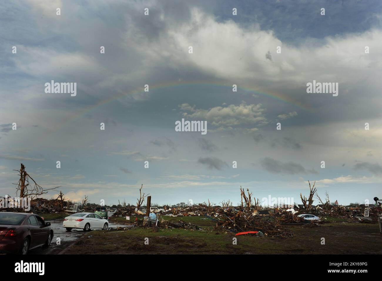 Moore, Okla., May 25, 2013 A rainbow forms in the sky next to Plaza ...