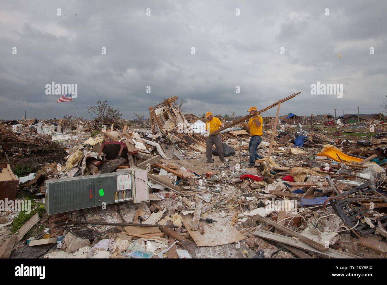 Moore, Okla., May 29, 2013   Southern Baptist volunteer clear debris in tornado stricken neighborhood of Westmoore. The Moore area was struck by a F5 tornado on May 20, 2013. Andrea Booher/FEMA.. Photographs Relating to Disasters and Emergency Management Programs, Activities, and Officials Stock Photo