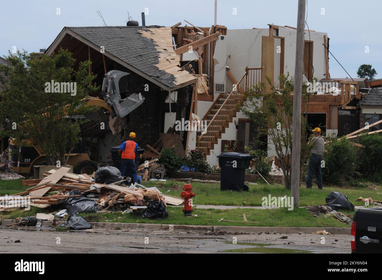 Tornado Destroyed Home Being Demolished.. Photographs Relating to