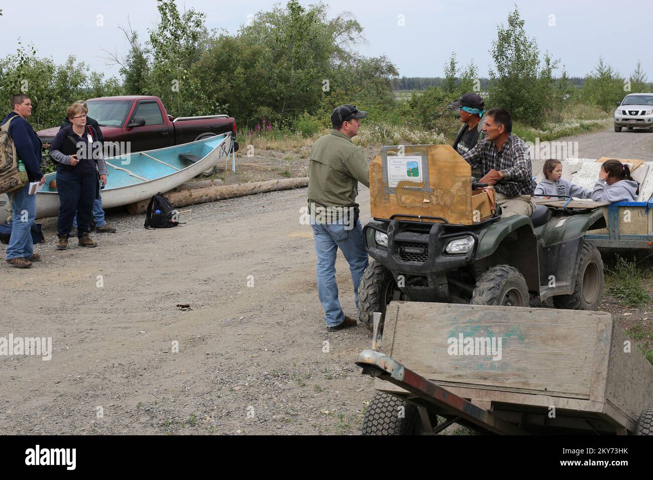 Fort Yukon, Alaska, July 6, 2013 FEMA inspectors survey the properties