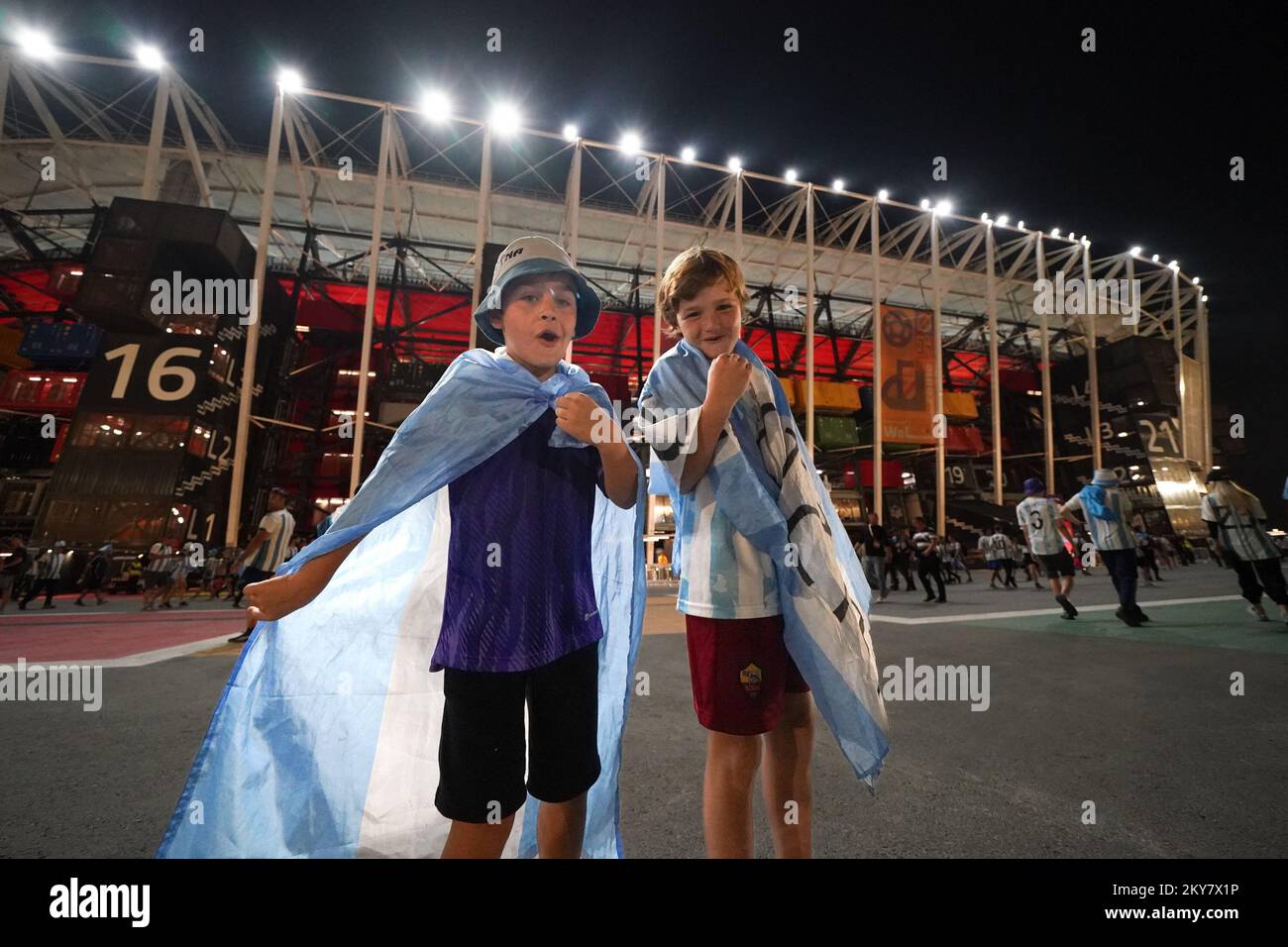 DOHA, QATAR - NOVEMBER 30: Supporters of Argentina pose for a photo before the FIFA World Cup Qatar 2022 group C match between Argentina and Poland at Stadium 974 on November 30, 2022 in Doha, Qatar. (Photo by Florencia Tan Jun/PxImages) Credit: Px Images/Alamy Live News Stock Photo