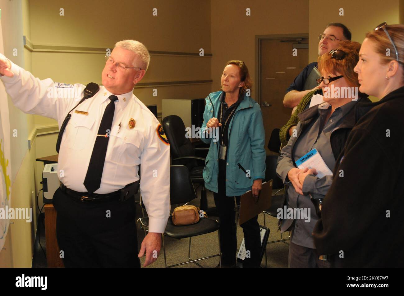 Fire Chief Briefs IAPDA Team on Damage Areas. Severe Winter