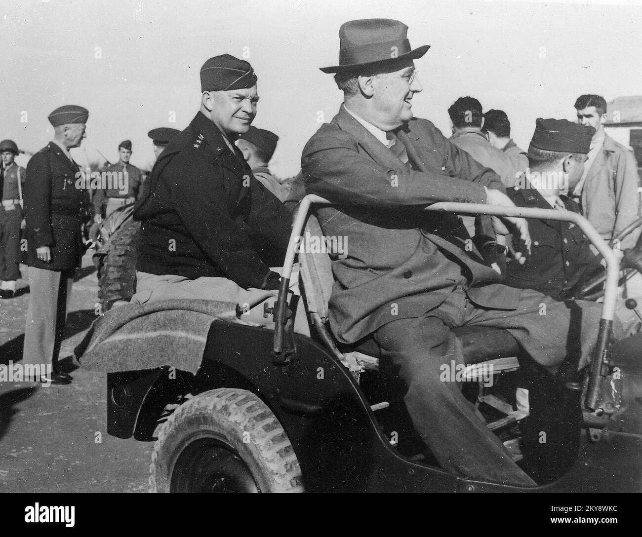 General Eisenhower, General Patton (standing to the left) and President Roosevelt in Sicily, 1943 Stock Photo