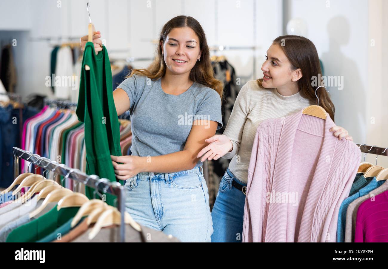 Woman with personal shopper shopping in store Stock Photo - Alamy