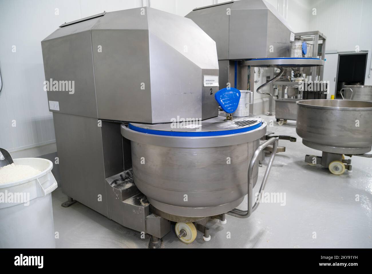 Commercial bread making equipment for mixing dough Stock Photo Alamy