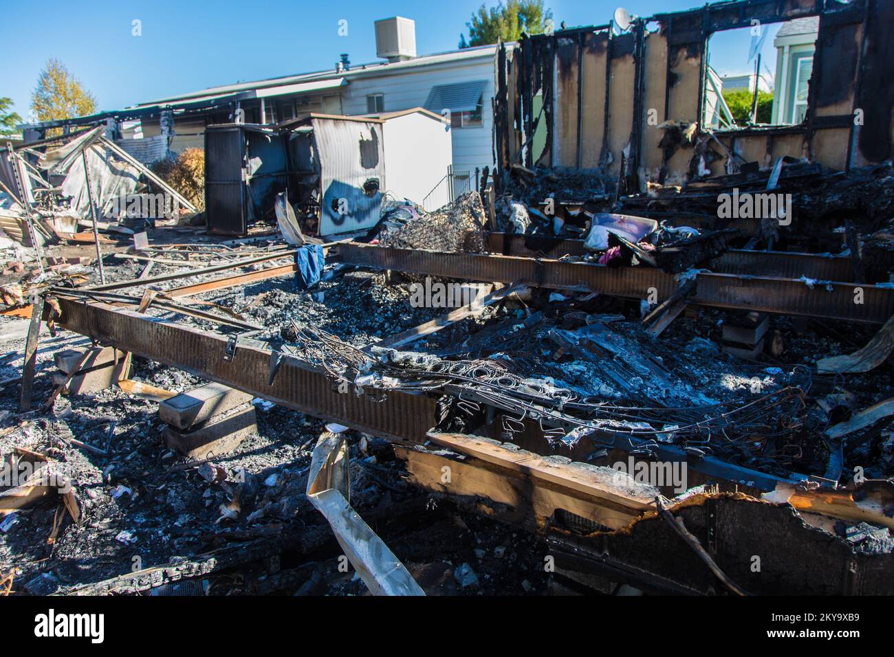 Napa, CA, August 30, 2014 ; Fire damage from broken gas lines at the Napa Valley Mobile Home Park in the City of Napa, California, which was struck by a 6.0 earthquake at 3:20 a.m. on August 24. 2014. At least 103 structures (44 homes, 59 businesses) were tagged by inspectors as unsafe to enter in the City of Napa after the earthquake. FEMA supports state, local and tribal governments in their efforts to recover from the effects of natural disasters.. Photographs Relating to Disasters and Emergency Management Programs, Activities, and Officials Stock Photo