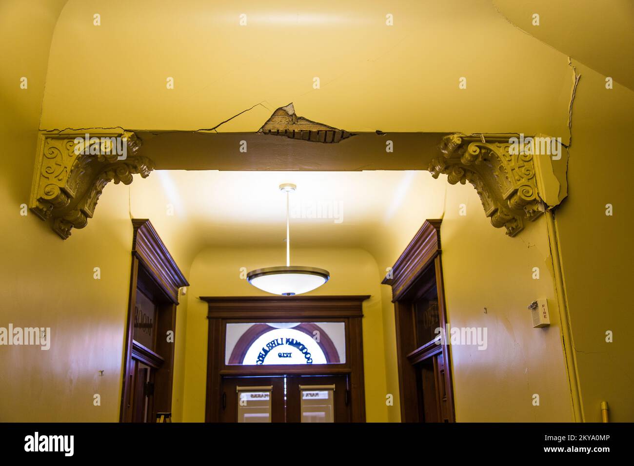 Napa, CA, September 9, 2014 ; Cracked plaster reveals wall lath and latticework in the historic Romanesque Goodman Library building in the City of Napa, California, which was struck by a 6.0 earthquake at 3:20 a.m. on August 24, 2014. The Goodman Library was donated to the City of Napa by philanthropist George Goodman in 1901 and is the longest continually operating library in the State of California. The building was seismically stabilized and retrofitted with assistance from FEMA in 2004-2005. FEMA supports state, local and tribal governments in their efforts to recover from natural disaster Stock Photo