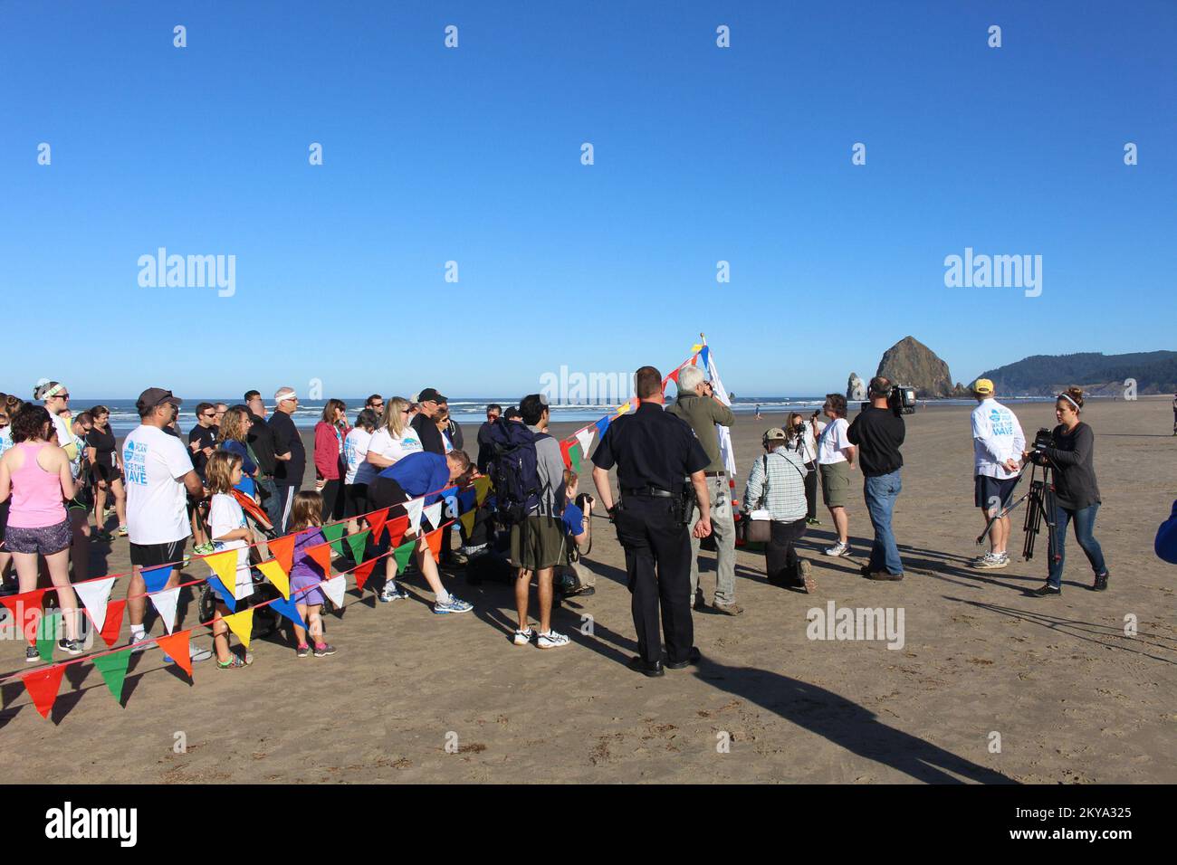 A Group of Cannon Beach, Oregon, residents prepare to ";Race the Wave