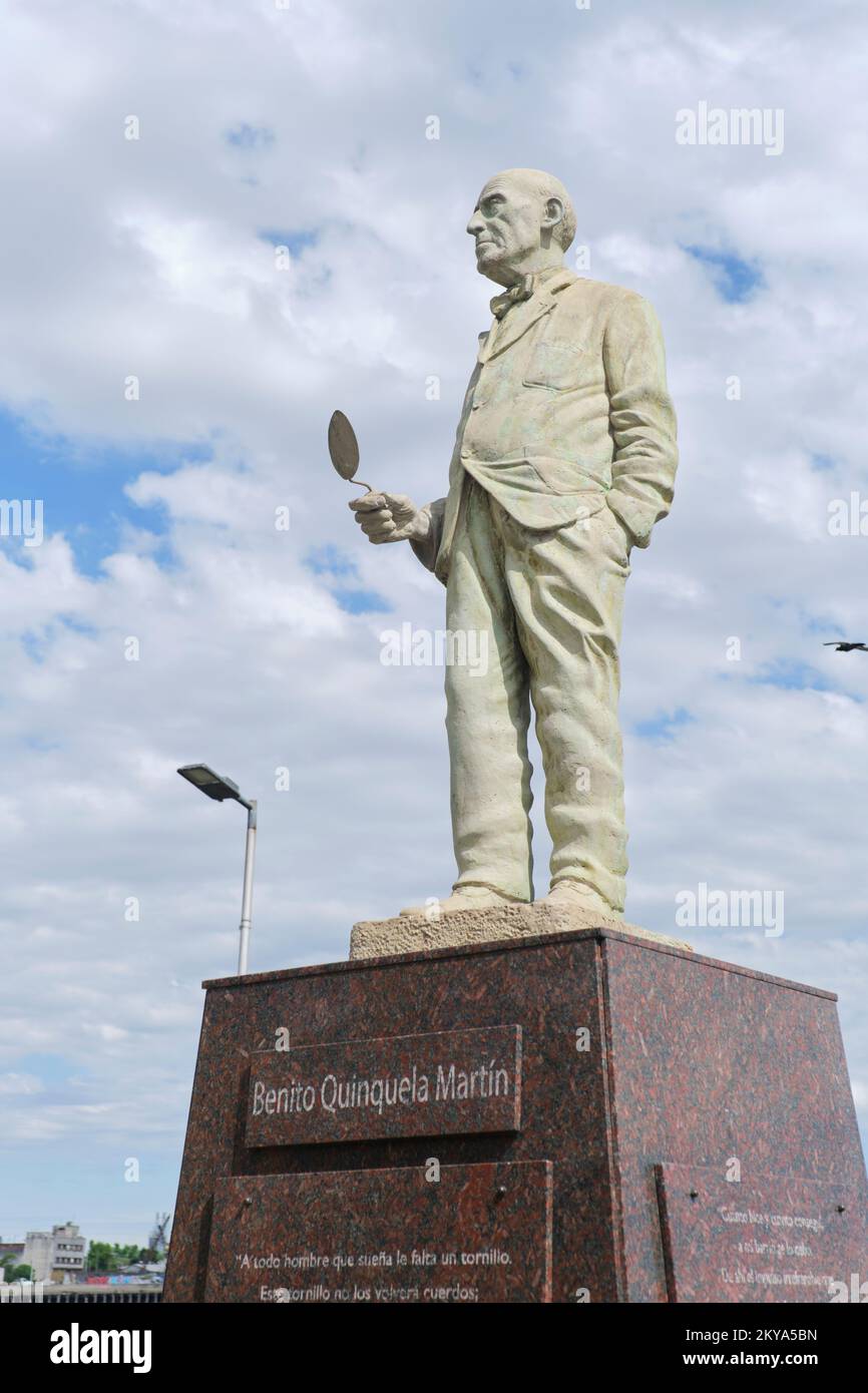 Dec 21, 2021, Buenos Aires, Argentina: sculpture of the painter and philanthropist Benito Quinquela Martin in La Boca neighborhood, his back to the Ri Stock Photo