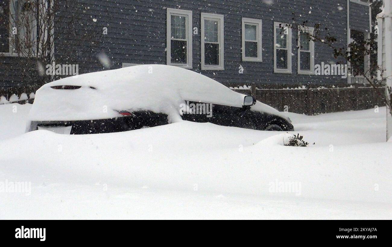 A large snowstorm brought heavy snow to Arlington, MA burying this