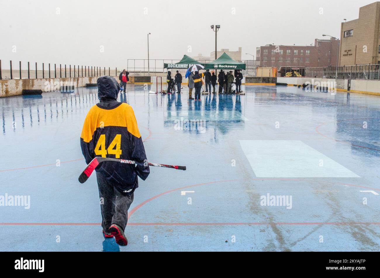 Rockaway Park, N.Y., Mar. 14, 2015 Councilman peric Ulrich, officials from the Department of Parks and Recreation and the Rockaway Community along with members of the Rockaway Rockies Roller Hockey Club, gathered for the Groundbreaking ceremony for a new roller rink at Beach 108th Street. FEMA's Public Assistance (PA) Grant Program provides assistance to State, Tribal and local governments so that communities can quickly respond to and recover from major disasters. K.C. Wilsey FEMA. New York Hurricane Sandy. Photographs Relating to Disasters and Emergency Management Programs, Activities, and O Stock Photo